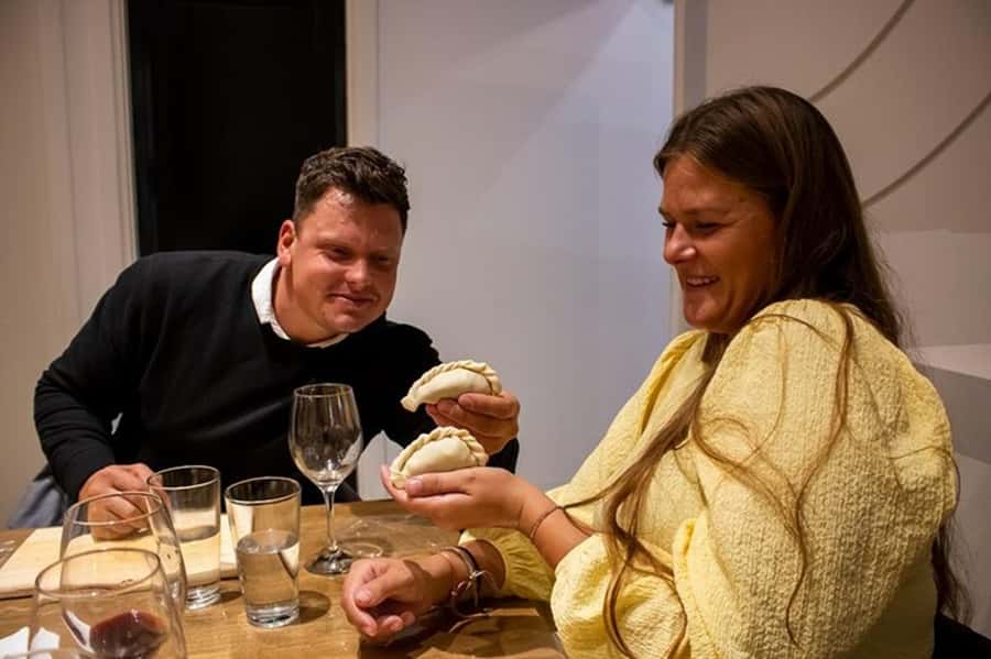 Argentinian Empanadas Cooking Experience in Palermo, Bs As - Eating what you made around the table