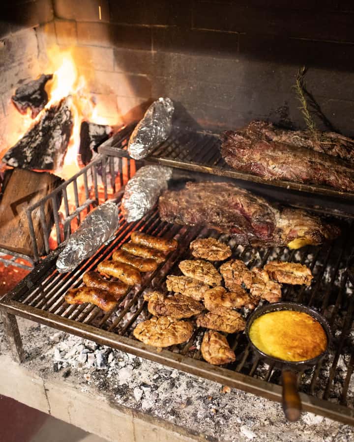 Buenos Aires: Authentic Argentine Asado BBQ with Live Music - Chorizo, mollejas, and provoleta from the fire